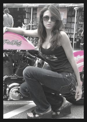 Photo of Julie Dubela with a Harley