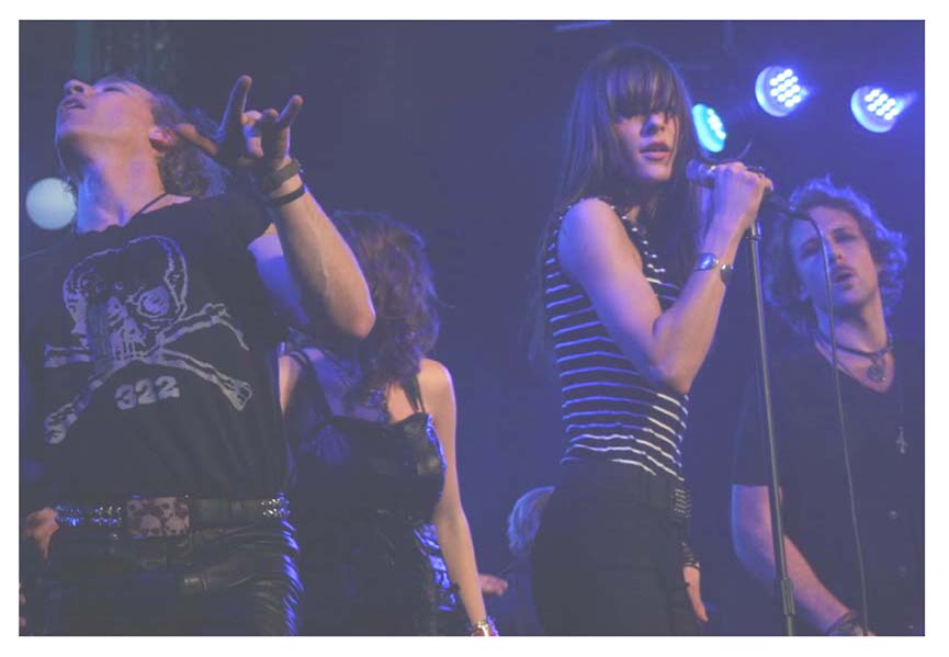 Photo of Julie Dubela performing with the Ultrasonic Rock Orchestra