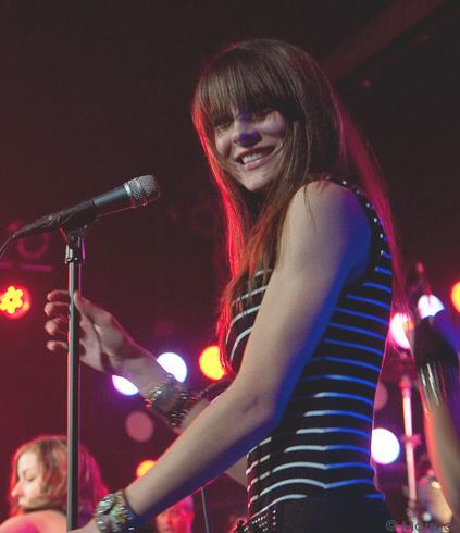 Photo of Julie Dubela performing with the Ultrasonic Rock Orchestra
