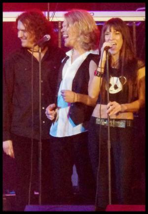 Photo of Julie Dubela performing with the Ultrasonic Rock Orchestra