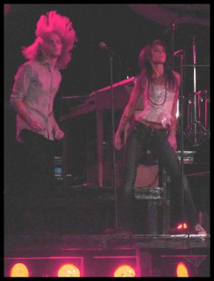 Photo of Julie Dubela performing with the Ultrasonic Rock Orchestra