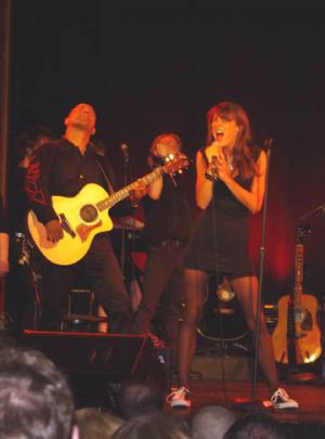 Photo of Julie Dubela performing with the Ultrasonic Rock Orchestra