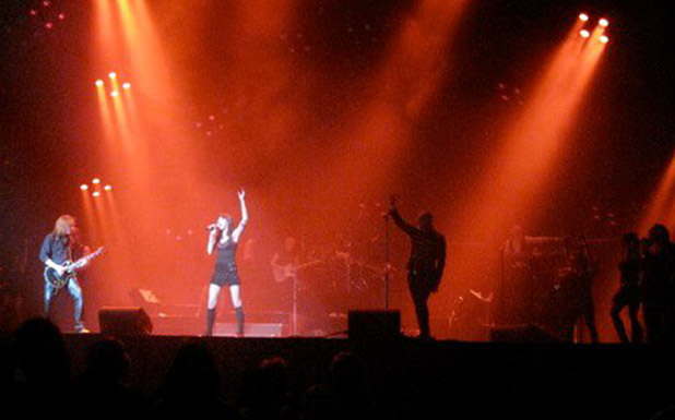 Photo of Julie Dubela performing with the Ultrasonic Rock Orchestra